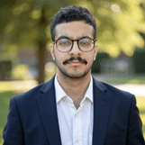 Headshot of Nima Aref
